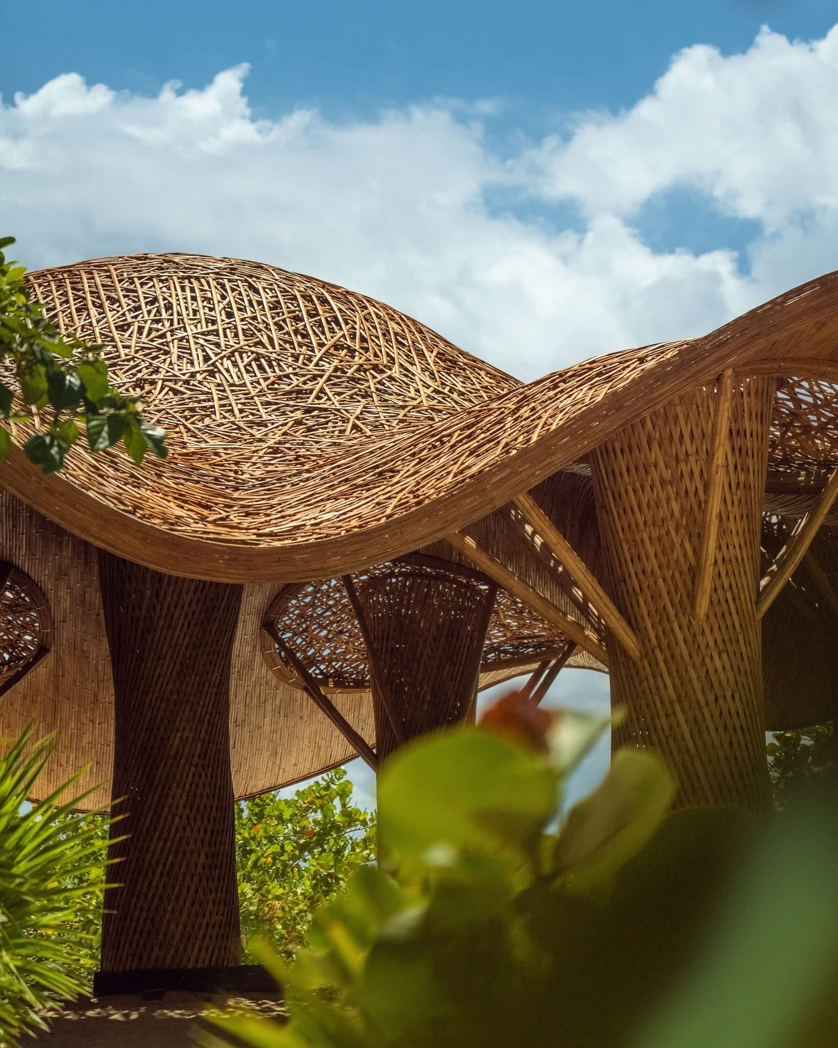 A woven rattan pavilion at Palmaïa